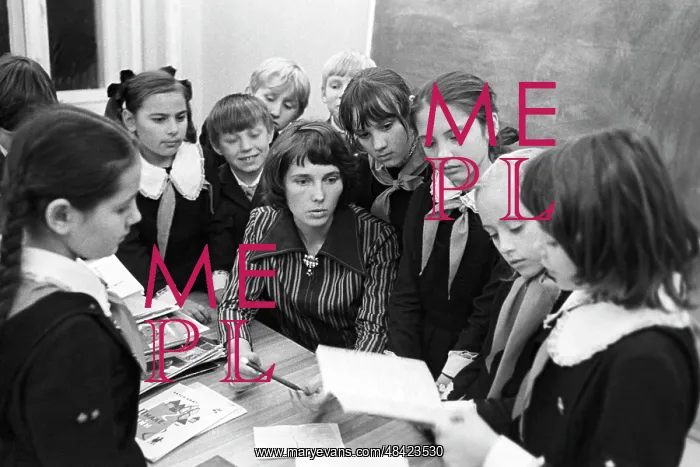 : Soviet teacher surrounded by pupils, 1977 : Soviet teacher surrounded by pupils, 1977