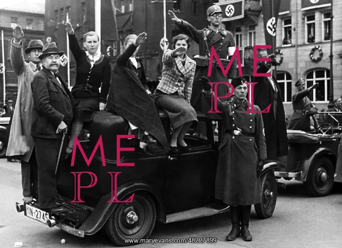 : Spectators on a car during the Nuremberg Rally, 1937 : Spectators on a car during the Nuremberg Rally, 1937