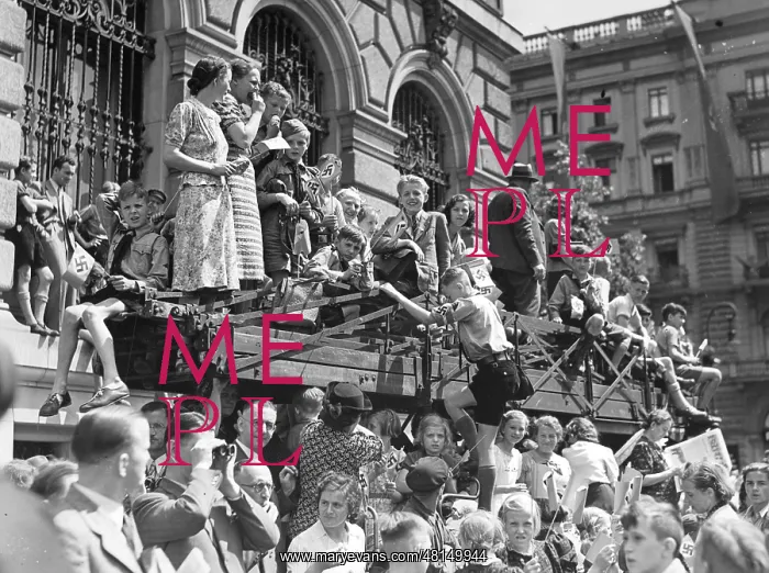 : Spectators wait for Hitler to drive passed : Spectators wait for Hitler to drive passed
