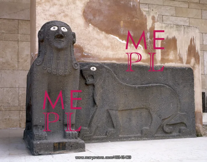 : Sphinx and a lion in relief. Basalt. Syria : Sphinx and a lion in relief. Basalt. Syria