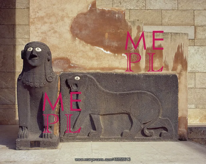 : Sphinx and a lion in relief. Basalt. Syria : Sphinx and a lion in relief. Basalt. Syria
