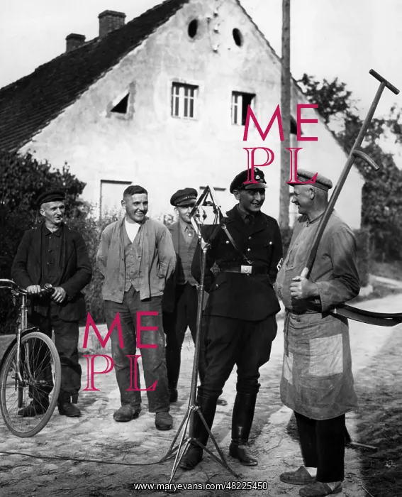 : SS man interviewing a farmer, 1933 : SS man interviewing a farmer, 1933
