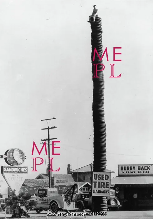 : A stack of tires as advertisement : A stack of tires as advertisement