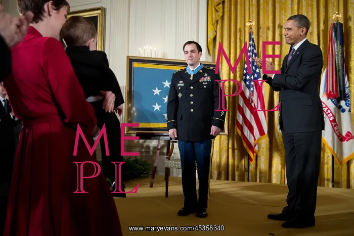 : Former Staff Sergeant Clinton Romesha receives the : Former Staff Sergeant Clinton Romesha receives the