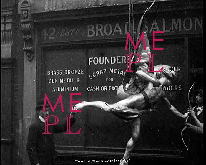 : A Statue Of Eros Being Lifted Up By A Crane : A Statue Of Eros Being Lifted Up By A Crane