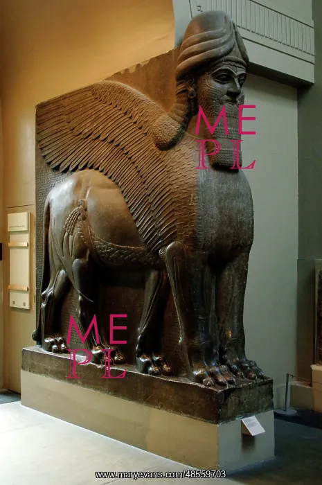 : Statue of a winged lion with human head. Nimrud : Statue of a winged lion with human head. Nimrud