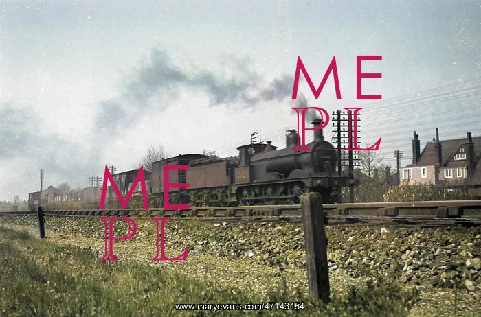 : Steam engine on a railway track : Steam engine on a railway track