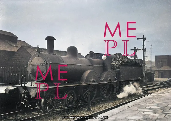  : Steam engine in a station