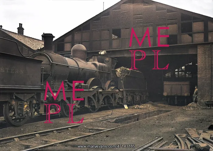 : Steam engine and tender on a railway track : Steam engine and tender on a railway track
