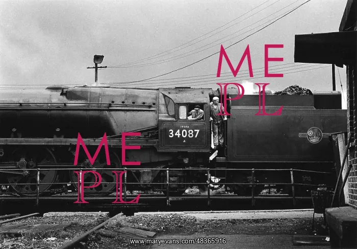 : Steam engine being turned on turntable : Steam engine being turned on turntable