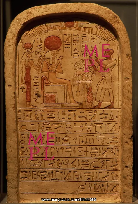  : Stele depicting a priest making an offering to the god Ra. E