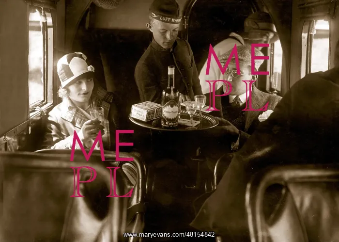 : A steward serves on board a Junkers G-24, 1928 : A steward serves on board a Junkers G-24, 1928