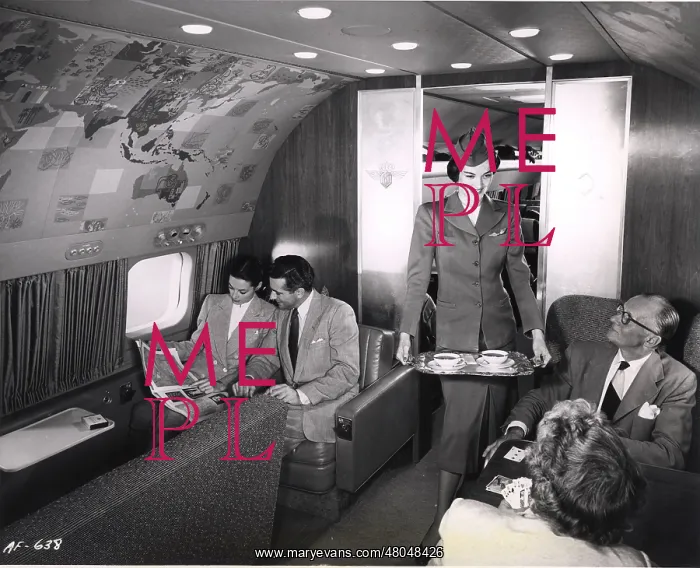 : A stewardess serves tea : A stewardess serves tea