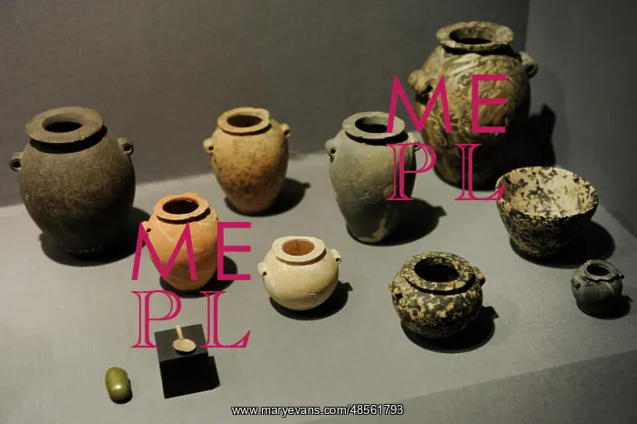 : Stone jars and bowls with a small spoon and a small grinding : Stone jars and bowls with a small spoon and a small grinding