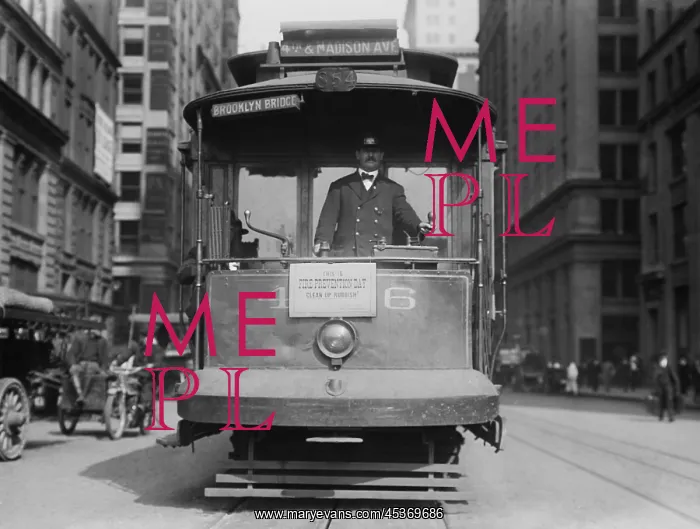 : A street car runs with sign This is fire prevention : A street car runs with sign This is fire prevention