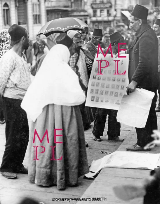 : Street hawkers selling paintings of the Sultan : Street hawkers selling paintings of the Sultan