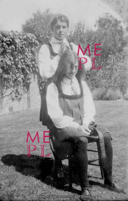 : Student with hair undone in garden : Student with hair undone in garden