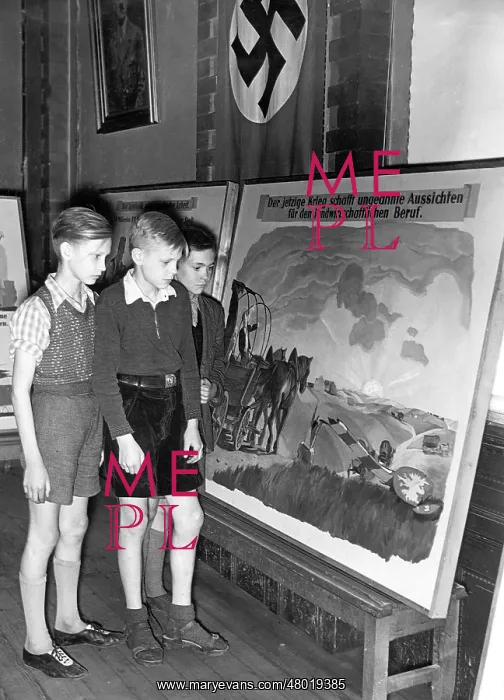 : Students at an exhibition about the peasantry, 1942 : Students at an exhibition about the peasantry, 1942