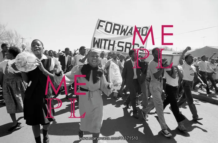 : Students marching to cemetery with grave flowers, for : Students marching to cemetery with grave flowers, for