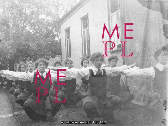 : Students outside doing squats : Students outside doing squats