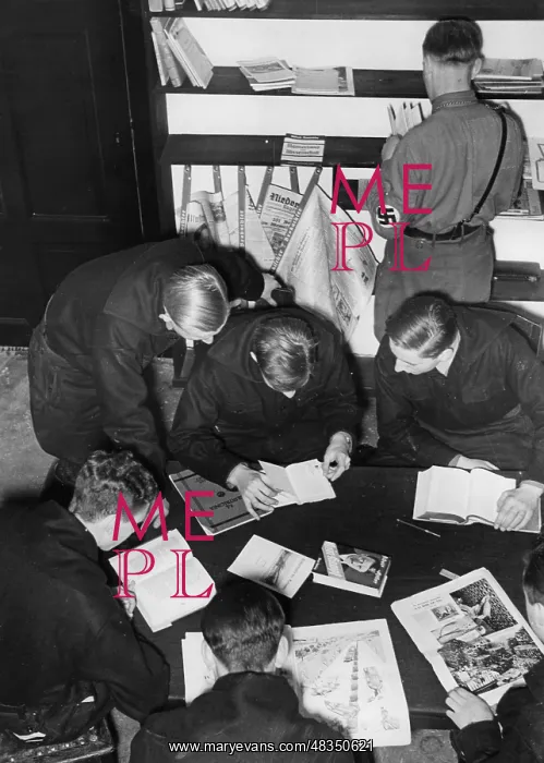 : Students reading in a Berlin comradeship house, 1934 : Students reading in a Berlin comradeship house, 1934