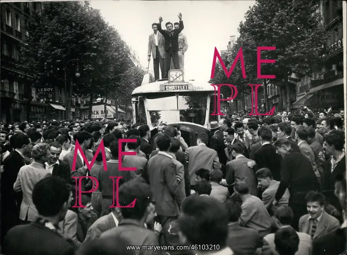 : Students stand on top of bus in Latin Quarter of Paris : Students stand on top of bus in Latin Quarter of Paris