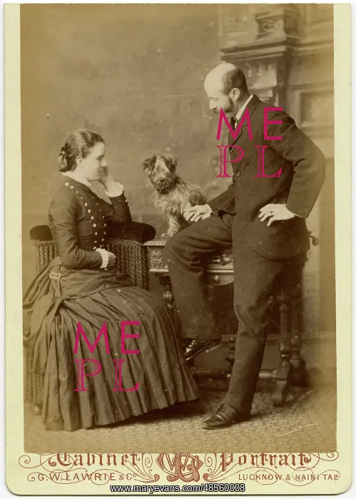  : Studio portrait, couple with terrier dog
