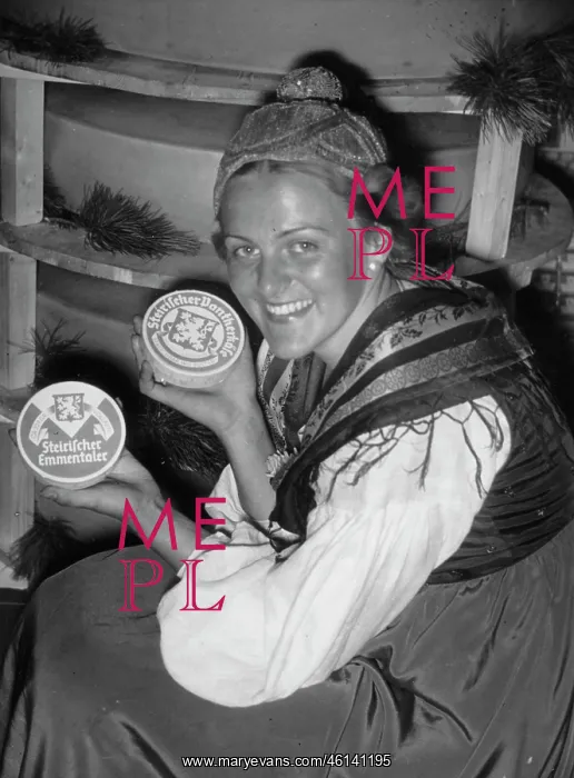 : A Styrian alp maid with products from : A Styrian alp maid with products from