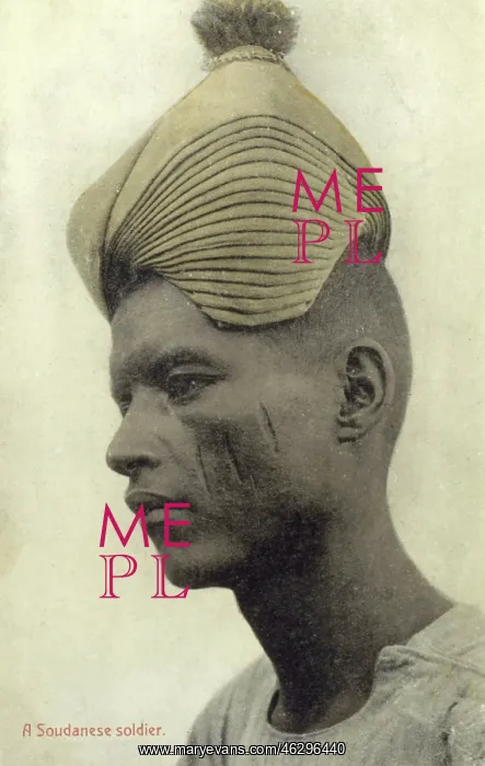 : Sudanese soldier with remarkable hat : Sudanese soldier with remarkable hat