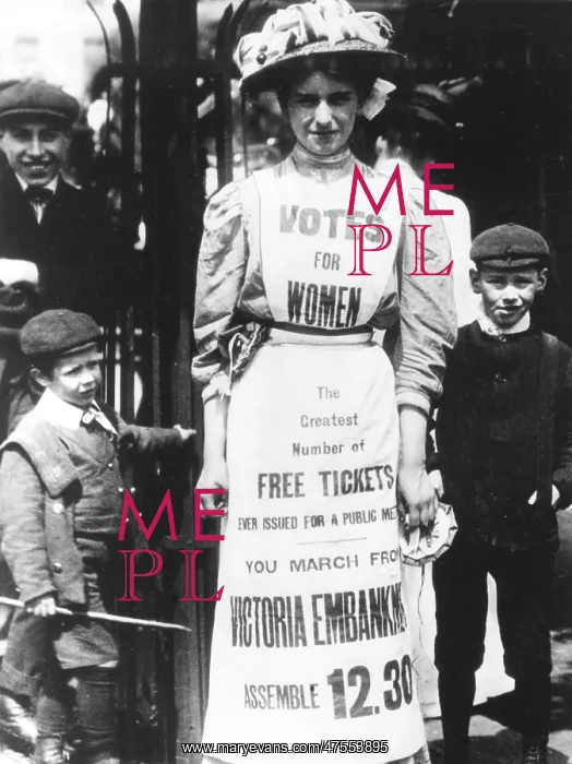 : A suffragette advertising a votes for women march : A suffragette advertising a votes for women march