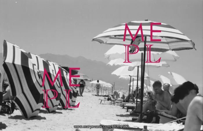 : Sunbathers under striped parasols - Kos : Sunbathers under striped parasols - Kos