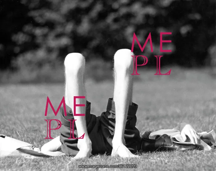 : Sunbathing on grass rolled up trousers knees in the air : Sunbathing on grass rolled up trousers knees in the air