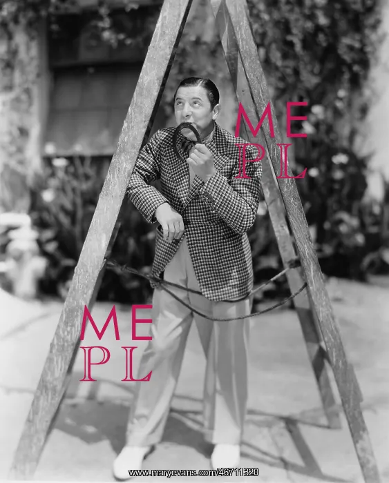 : Superstitious man walking under ladder : Superstitious man walking under ladder