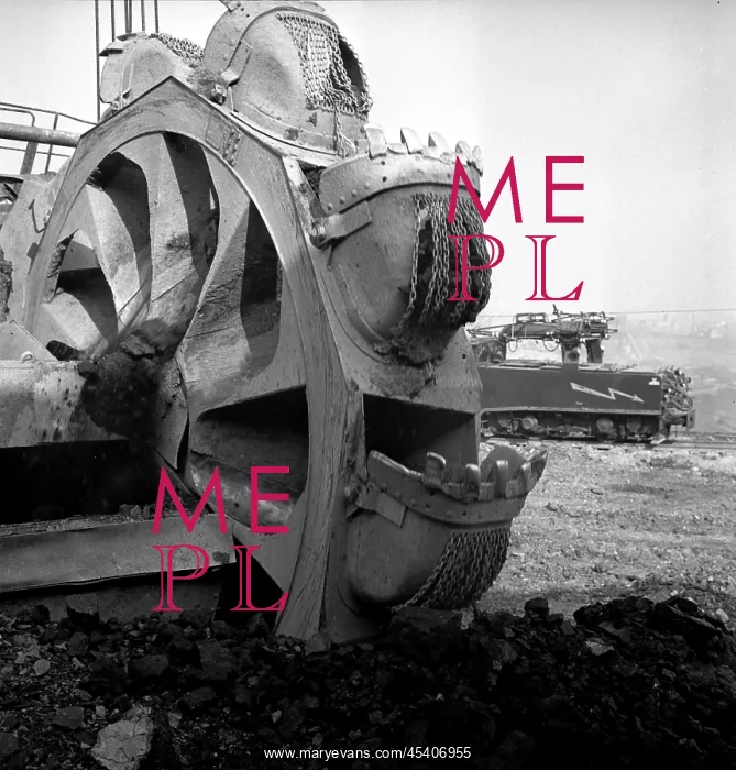 : Surface mining - machine scoops coal - brown coal : Surface mining - machine scoops coal - brown coal
