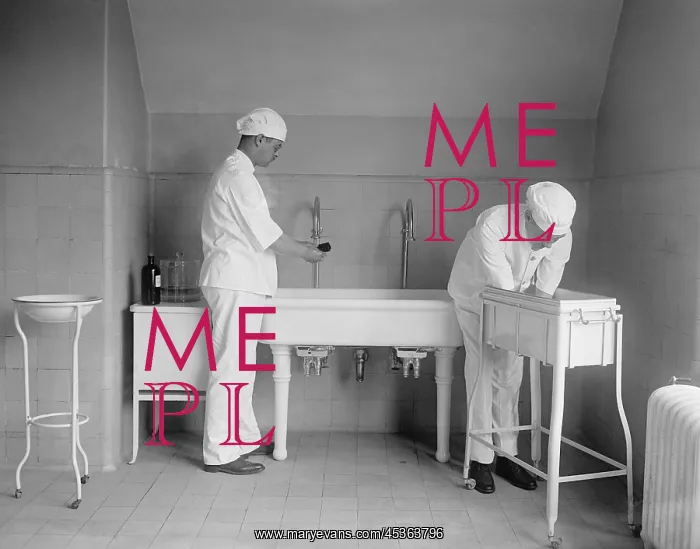 : Surgeon and anesthesiologist carefully wash their : Surgeon and anesthesiologist carefully wash their