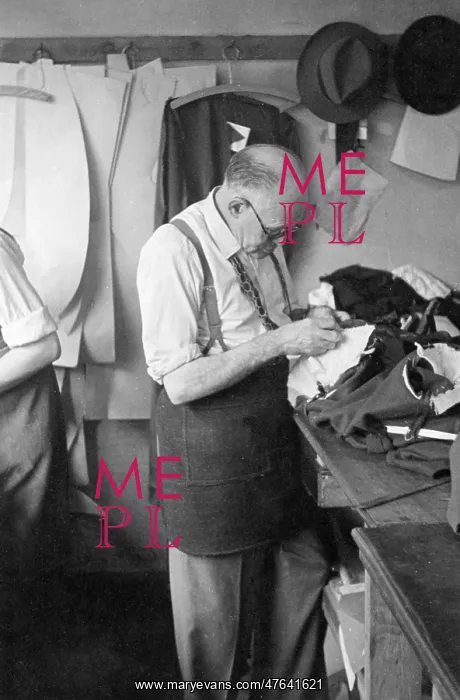  : Tailor at work on a garment