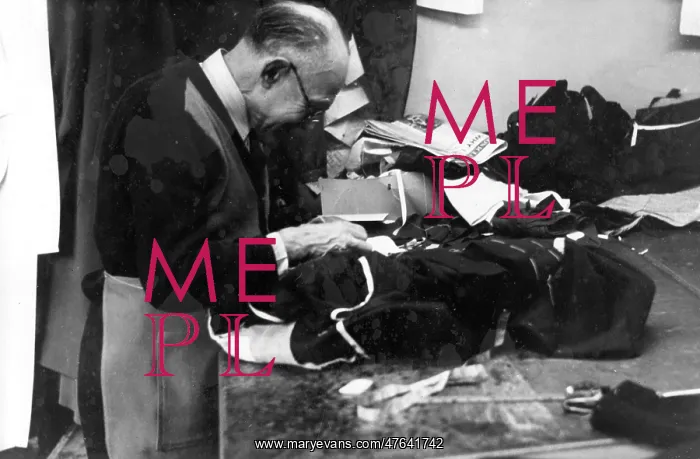  : Tailor at work on a garment