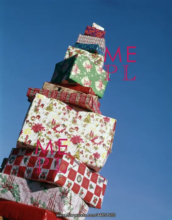 : Tall pile of giftwrapped Christmas presents : Tall pile of giftwrapped Christmas presents