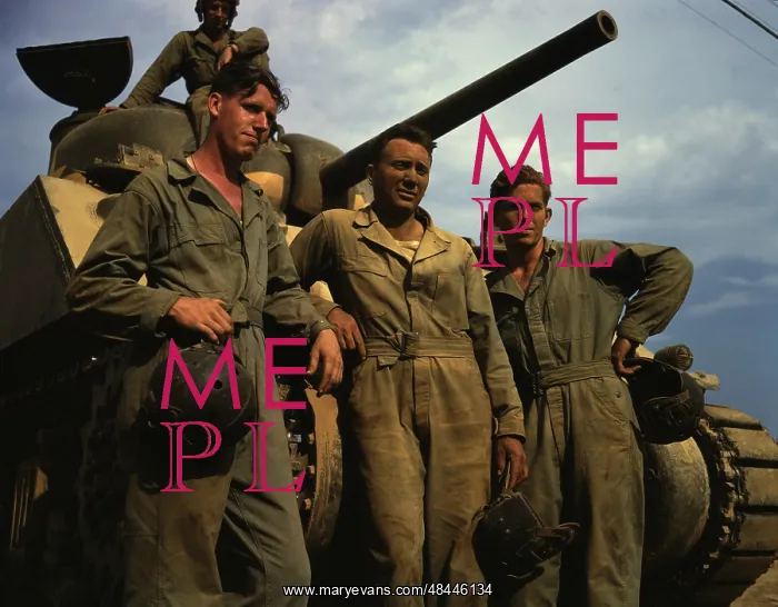 : Tank crew standing in front of an M4 tank : Tank crew standing in front of an M4 tank