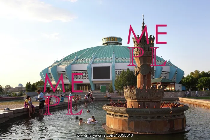 : Tashkent. Low angle view of fountain with the Circus : Tashkent. Low angle view of fountain with the Circus
