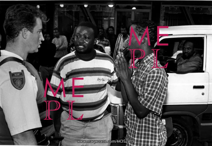 : A taxi driver explains to Constable Nel that he caught : A taxi driver explains to Constable Nel that he caught