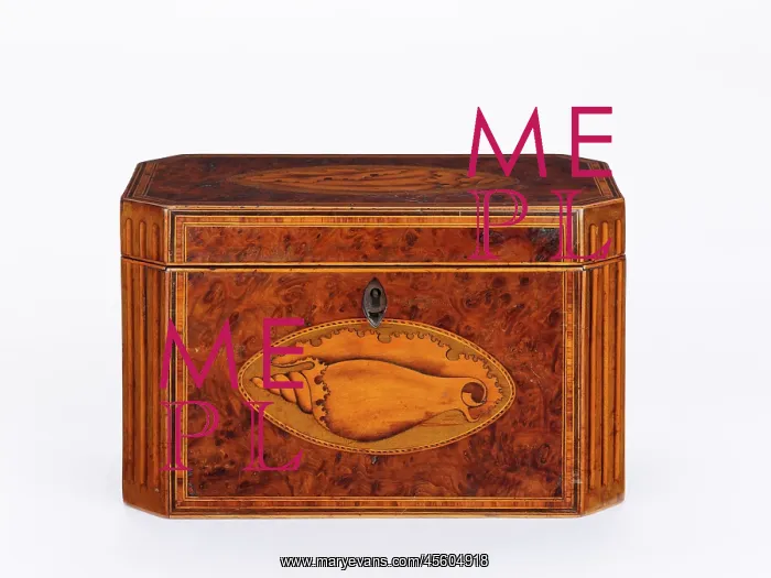 : Tea caddy. Burr yew tea caddy of rectangular form with canted corners : Tea caddy. Burr yew tea caddy of rectangular form with canted corners
