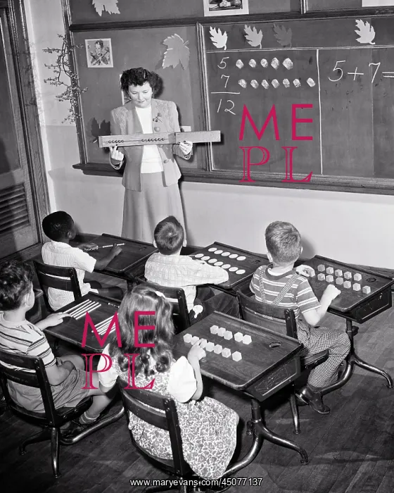 : Teacher and Six Elementary Students in a Maths Class : Teacher and Six Elementary Students in a Maths Class
