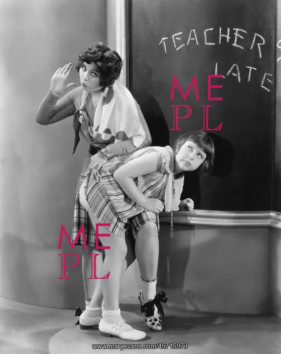 : Teacher spanking a girl in a classroom : Teacher spanking a girl in a classroom