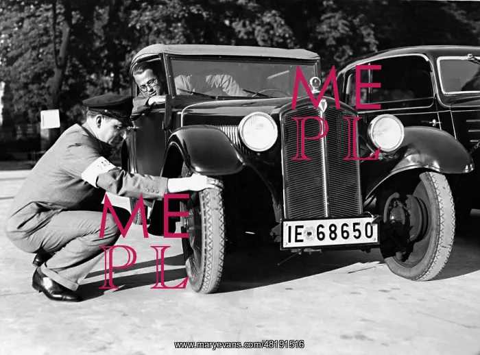 : Technical inspection of a car in Berlin, 1934 : Technical inspection of a car in Berlin, 1934