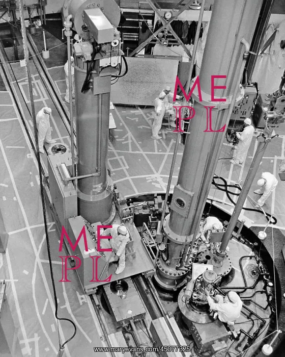 : Technicians Fueling Nuclear Electric Power Reactor : Technicians Fueling Nuclear Electric Power Reactor