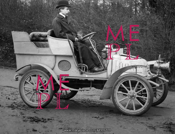 : Ted Whomes in motor car : Ted Whomes in motor car