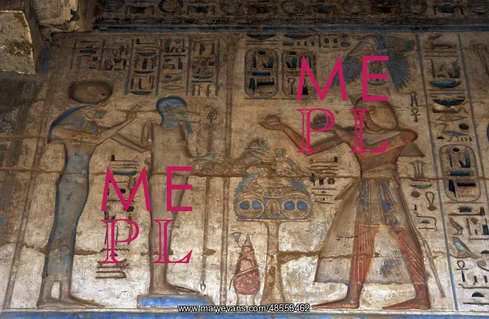 : Temple of Ramses III. The pharaoh making offerings before go : Temple of Ramses III. The pharaoh making offerings before go