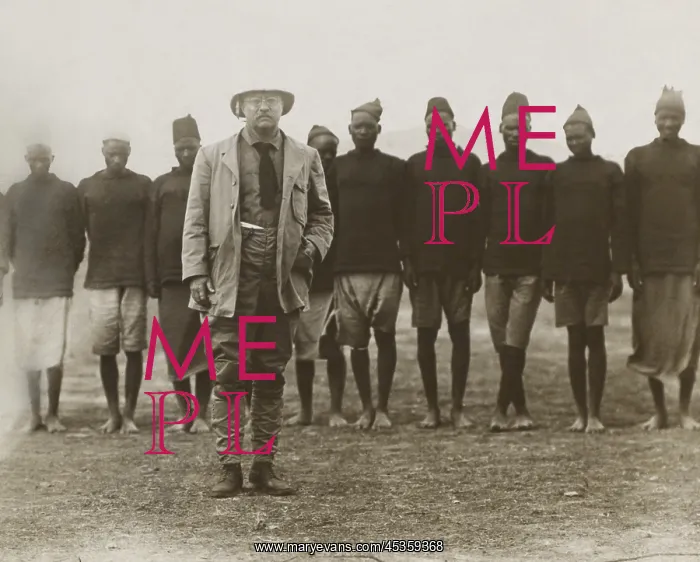 : Theodore Roosevelt standing in front of African : Theodore Roosevelt standing in front of African
