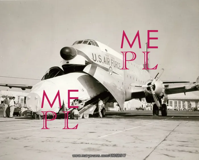 : A Thor missile is loaded into a Douglas C-124 Globemaster II : A Thor missile is loaded into a Douglas C-124 Globemaster II